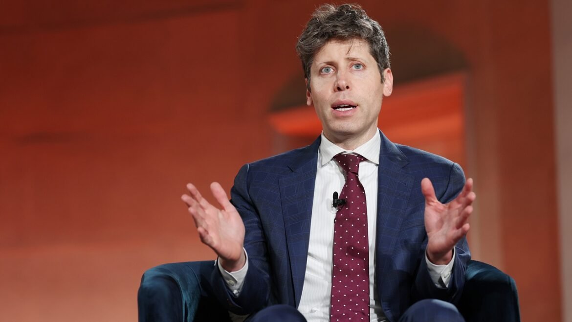 OpenAI CEO Sam Altman speaking while seated