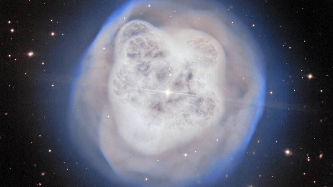 A glowing ball of white gas in the darkness of space