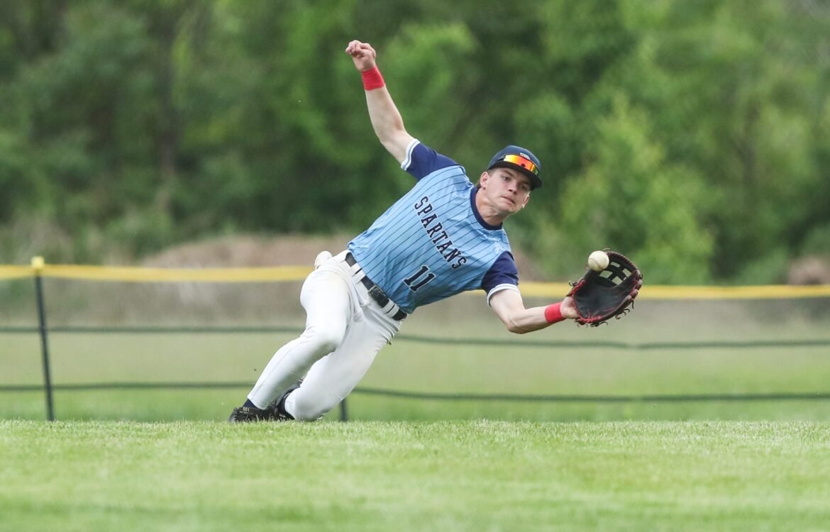 Matthew Kulyk (11) of Doane Academy makes a diving catch for an out during the 52nd annual Joe Hartmann Diamond Classic first round baseball game between Doane Academy and Schalick at Doane Academy in Burlington, NJ on 5/6/26.