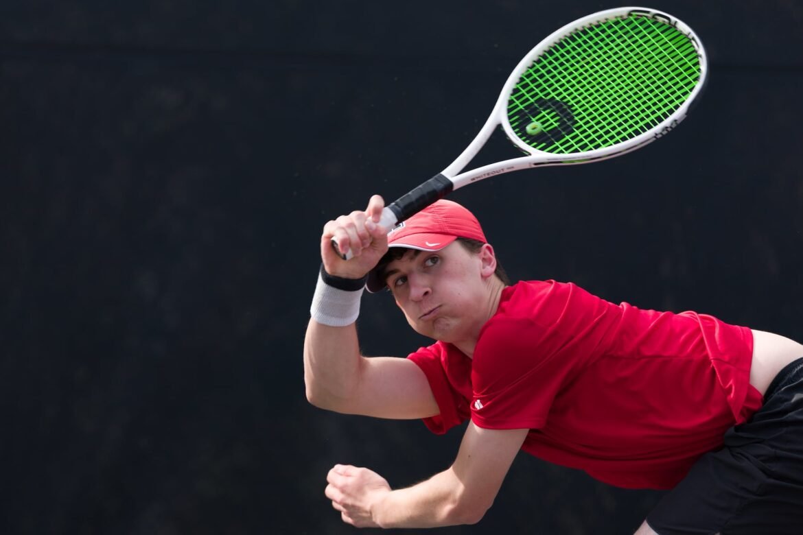 Luke Bysiek of Northern Highlands watches his return against Ridgewood in 1st singles of Monday's high school boys tennis showdown in Allendale. 04/13/2026