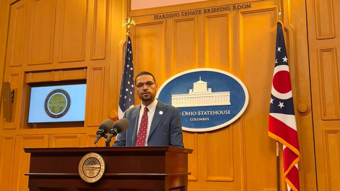 State Rep. Josh Williams stands behind the podium as he introduces a bill inside the Harding Senate Briefing Room.