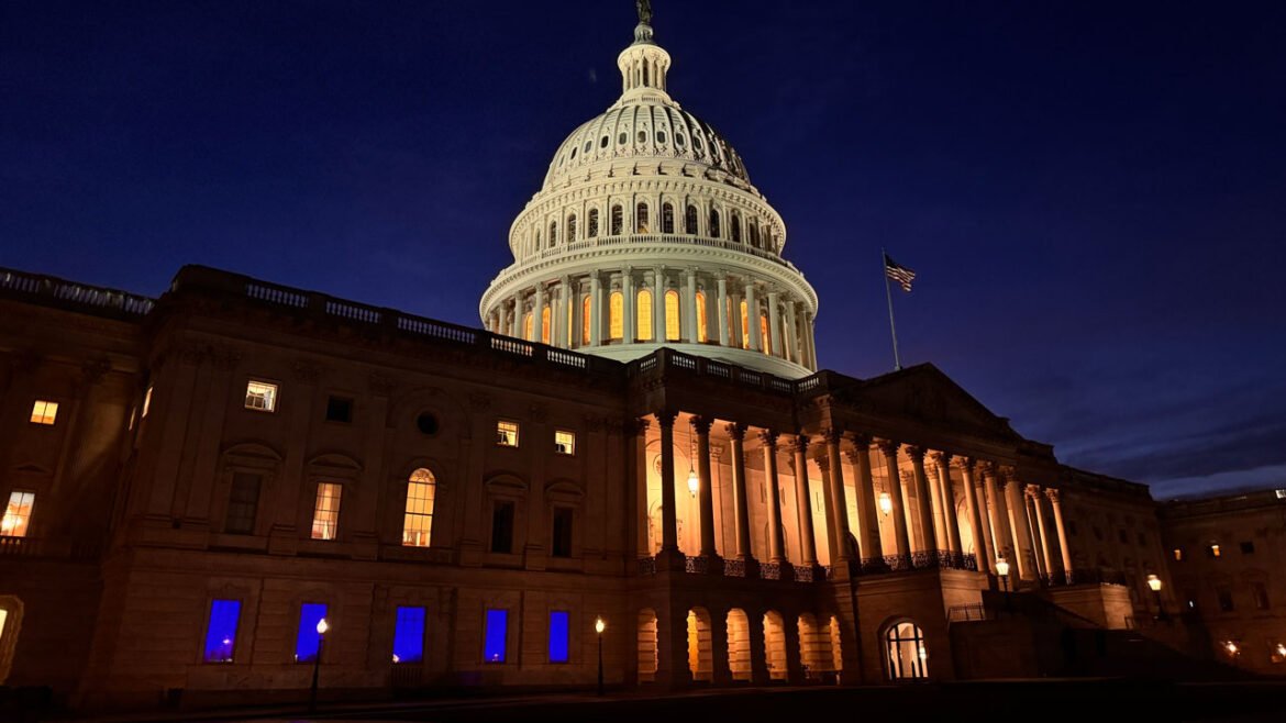Blue lights honoring law enforcement officers can be seen shining out of Majority Whip Tom Emmers office in the U.S. Capitol in 2025.