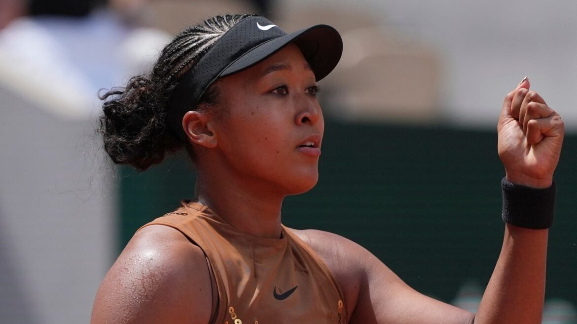 Naomi Osaka of Japan celebrates winning the third round women's singles tennis match against against Iva Jovic of the U.S. at the French Open tennis tournament in Paris, Saturday, May 30, 2026. (AP Photo/Thibault Camus)