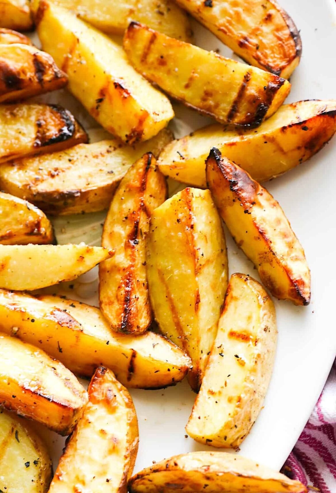 Freshly grilled potato wedges deliver a mouthwatering side for steak and chicken.