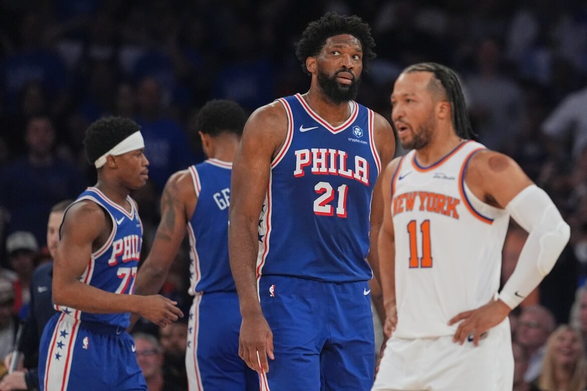 Watch Philadelphia 76ers center Joel Embiid (21) try to keep his team's season alive against the New York Knicks and guard Jalen Brunson, right, when they meet in Game 4 on Sunday, May 10. (AP Photo/Seth Wenig)