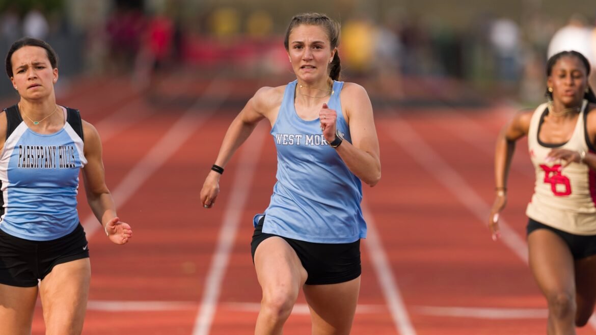 Alanna Parkes of West Morris Central storms to the finish in the Girls 100m at the NJAC East High School Track and Field Championships at Morris Hills High School in Rockaway on Tuesday. 05/05/2026