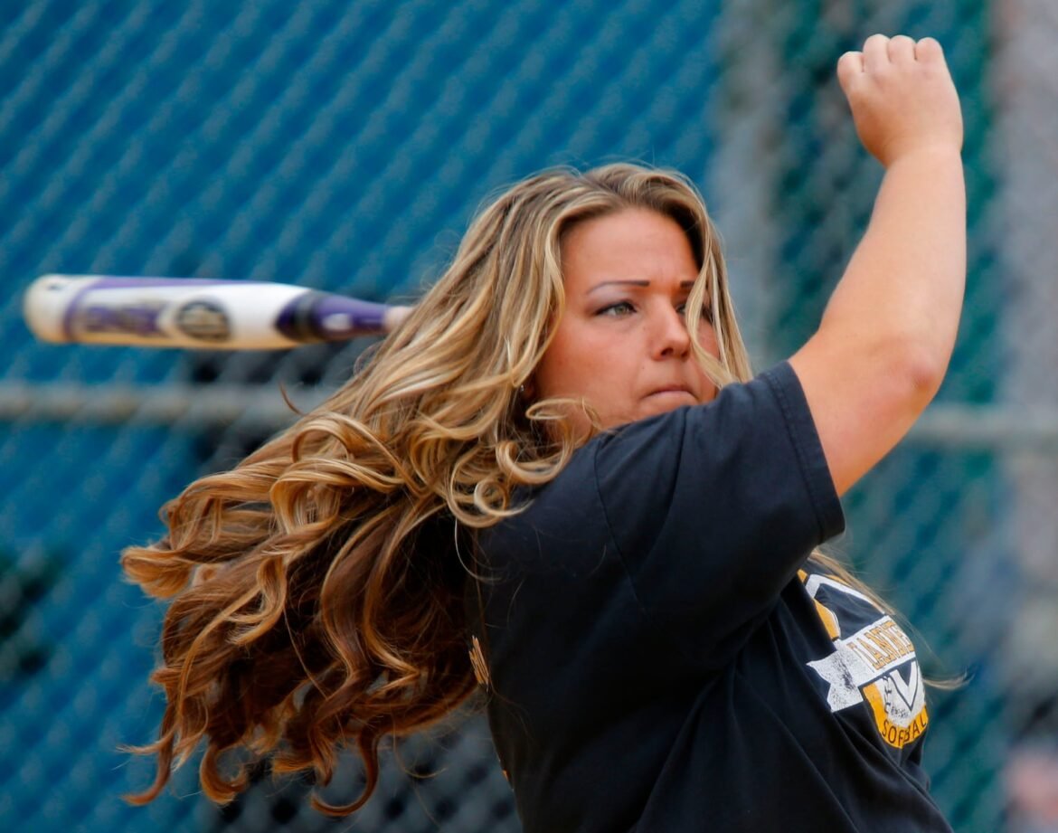 St. John Vianney softball coach Kim Lombardi warms up players before game against Matawan.St. John Vianney defeated Matawan 2-0. Wall Twp.,NJ. Saturday, May 16, 2015.(Noah K. Murray | NJ Advance Media for NJ.com) NJ Advance Media for NJ.com