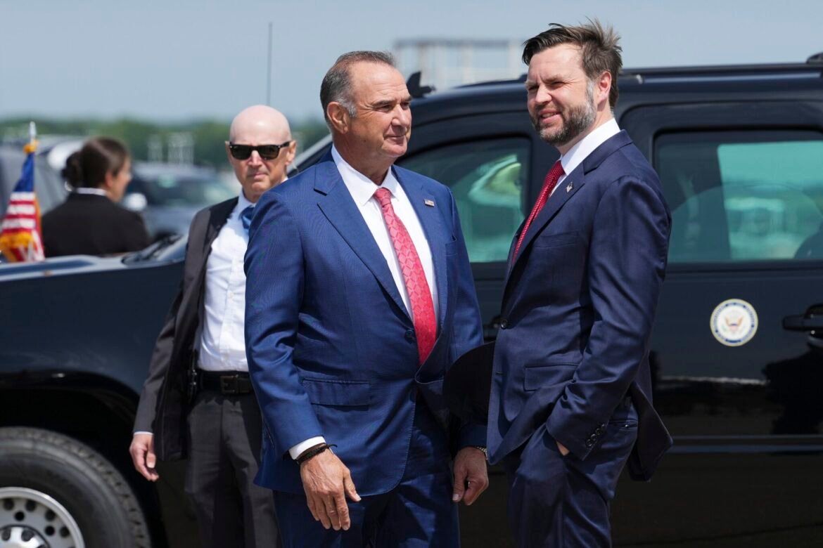 Missouri Governor Mike Kehoe, left, talks with U.S. Vice President JD Vance after he arrived at Kansas City International Airport, May 18, 2026 in Kansas City, Missouri. Vance on his visit pitched voters on keeping Republicans in control of Congress. (Photo by Eric Lee-Pool/Getty Images)