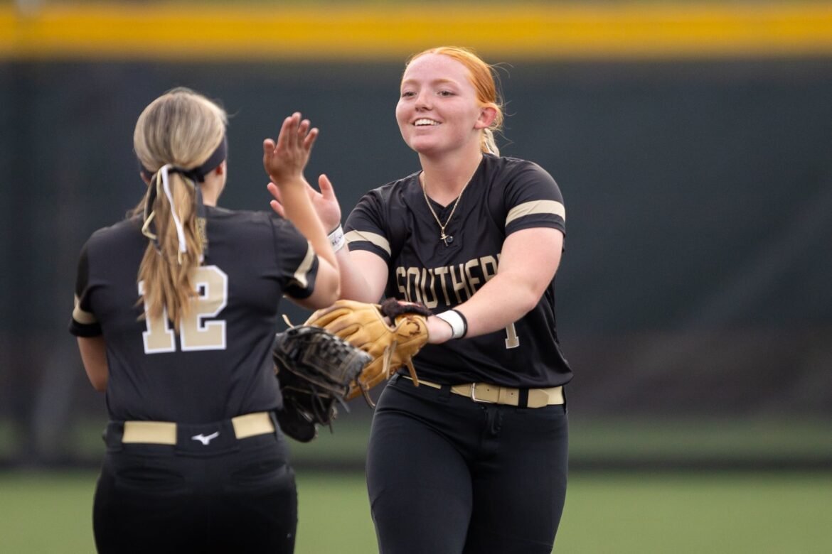 Emily Zellman (1) of Southern high fives Christina Brooks (12) during the Ocean County Softball Tournament Final at Adventure Crossing in Jackson, NJ on Wednesday, May 6 2026.