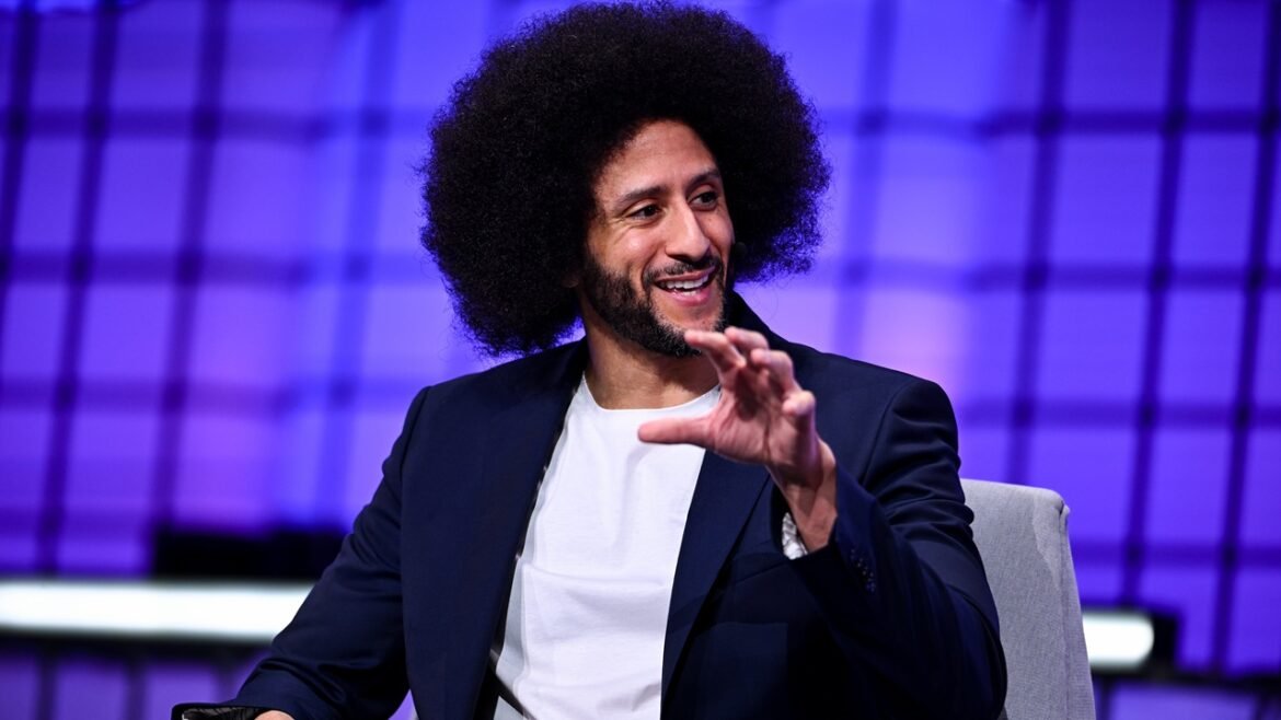 Colin Kaepernick speaking while seated
