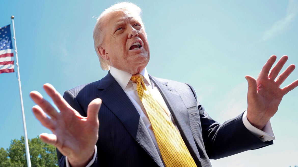 President Donald Trump speaks to reporters at the White House.