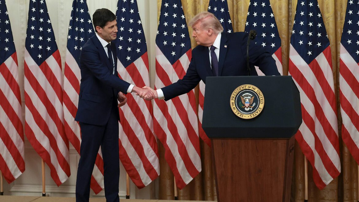 Kevin Warsh and Donald Trump shake hands
