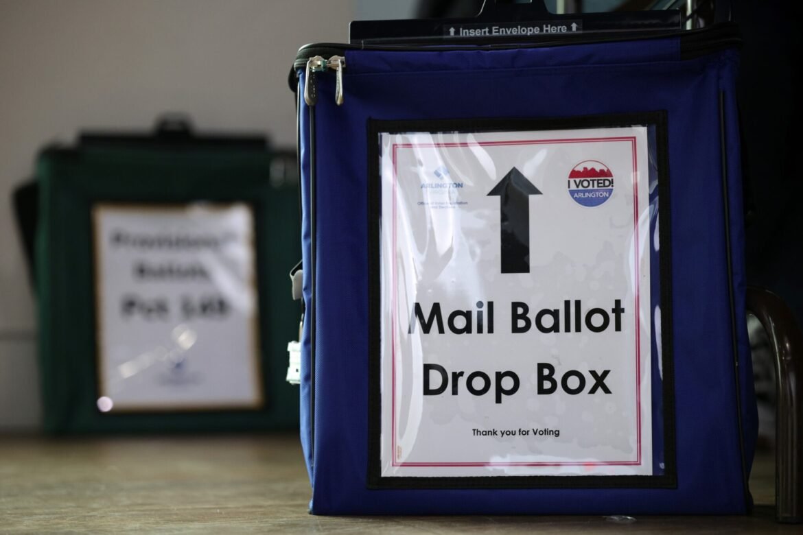 A mail ballot drop box is seen at a polling station on Nov. 4, 2025 in Arlington, Virginia. D.C. District Court Judge Carl Nichols on May 28, 2026, declined to block, for now, an executive order by President Donald Trump on mail-in voting. (Photo by Alex Wong/Getty Images)