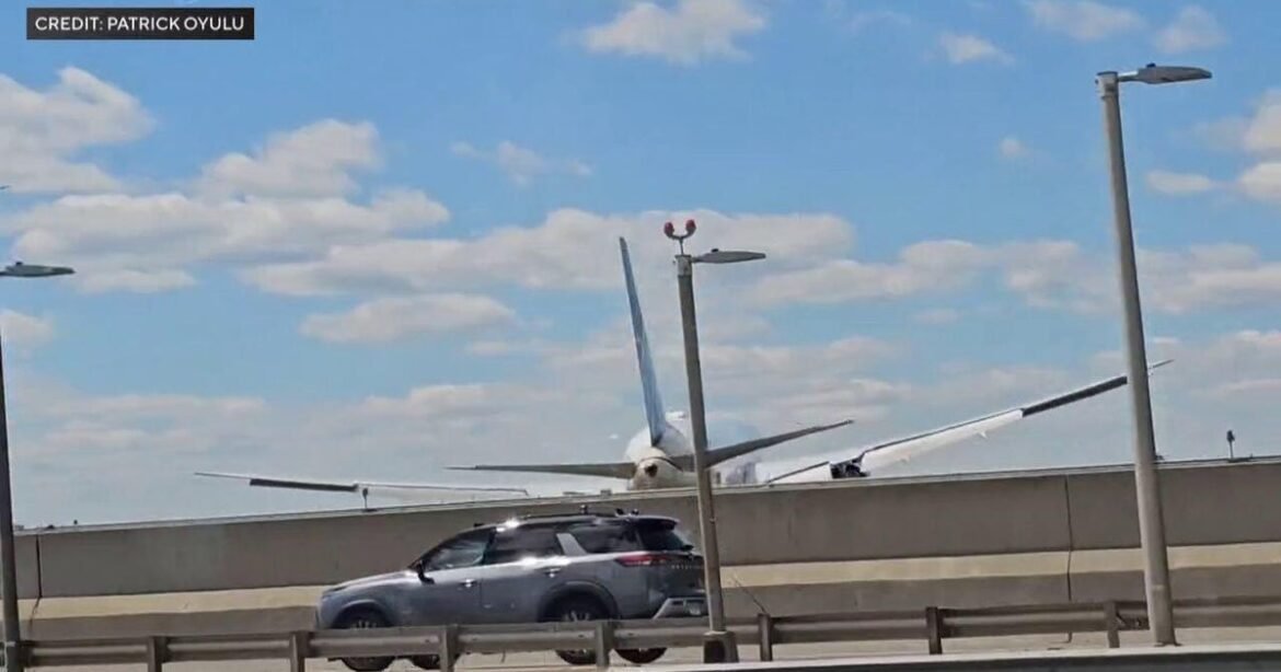United flight landing at Newark Liberty Airport strikes light pole, truck on New Jersey Turnpike, officials say