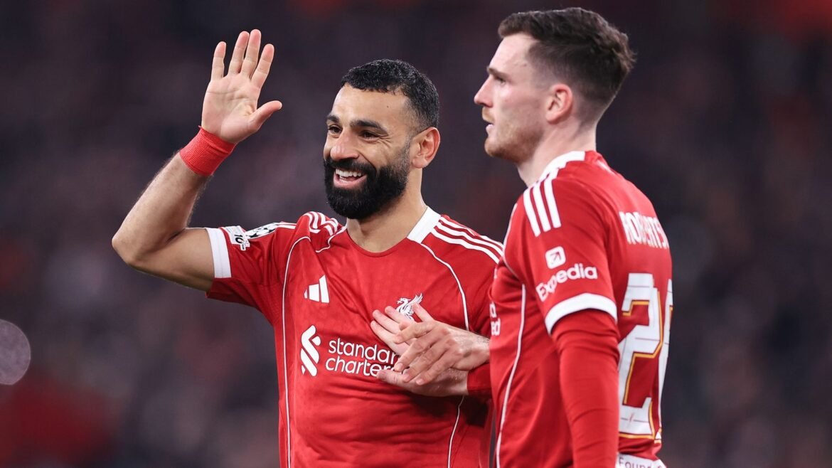 Mohamed Salah of Liverpool (L) celebrates with Andrew Robertson