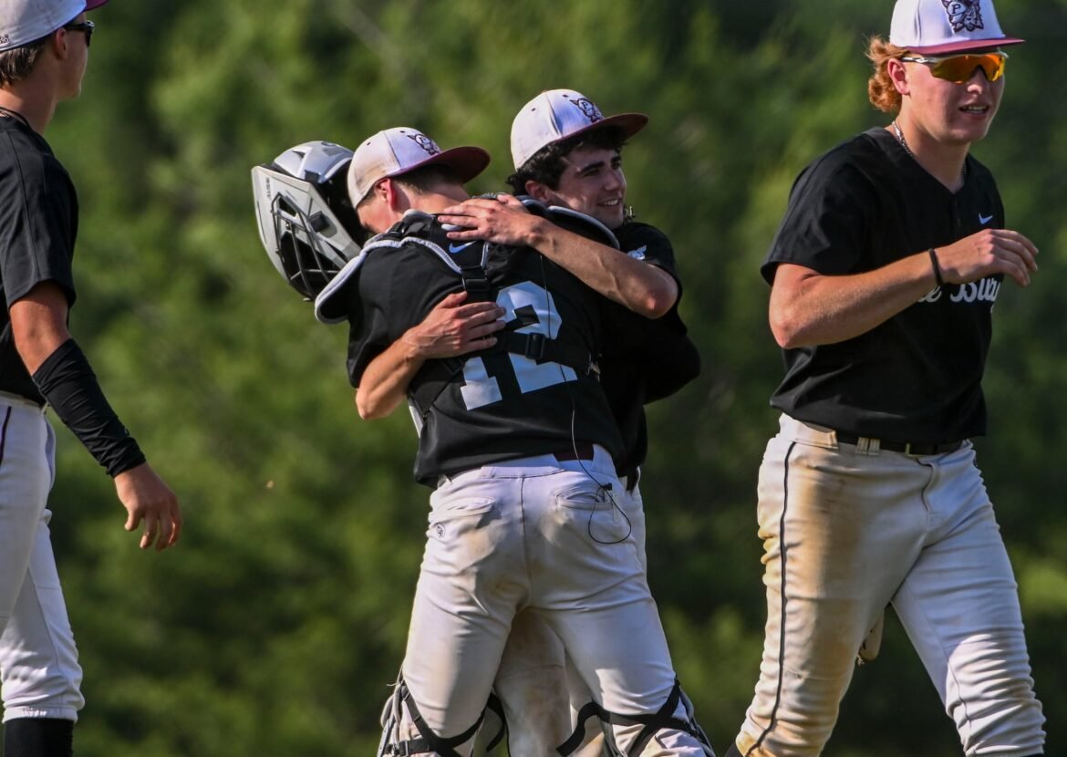 Phillipsburg catcher Brent Ott (12) gives pitcher Nick Yaccarino (2) a hug after Phillipsburg defeated Columbia in the first round of the NJSIAA North 2 Group 4, May 27, 2026 at Phillipsburg.
