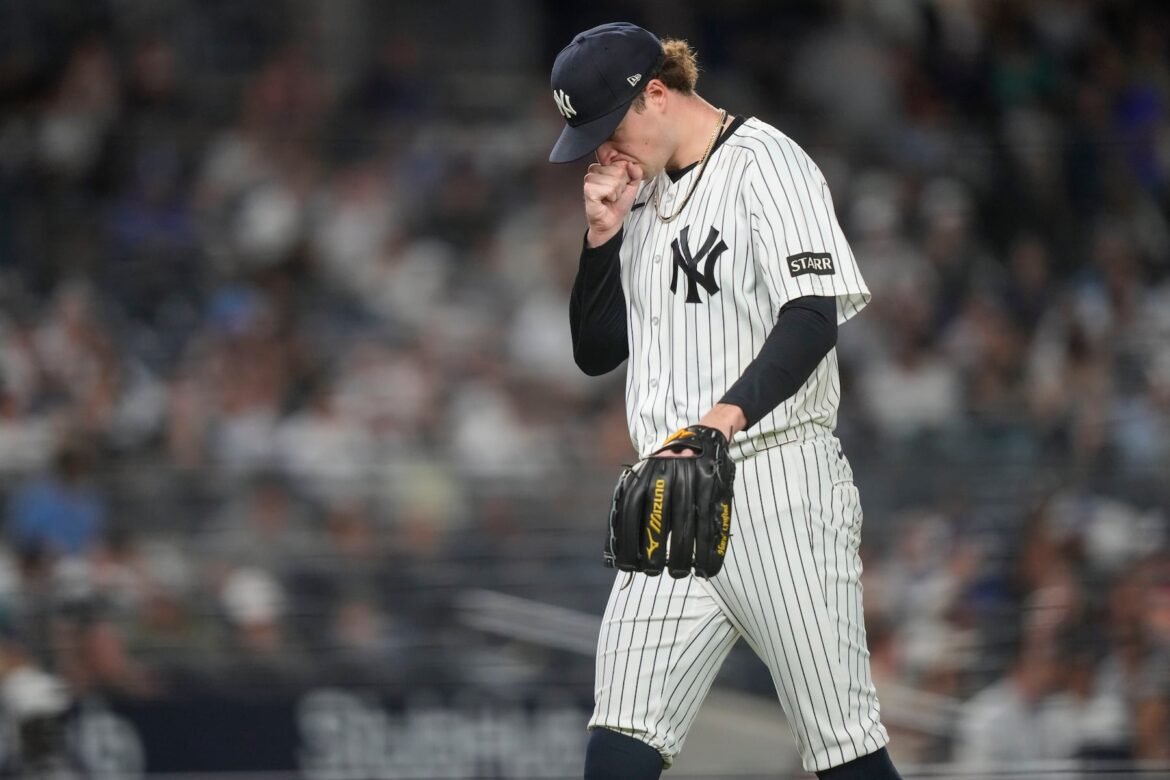 New York Yankees pitcher Cam Schlittler (31) walks to dugout during the seventh inning of a baseball game against the New York Yankees, Wednesday, May 20, 2026, in New York. (AP Photo/Yuki Iwamura)