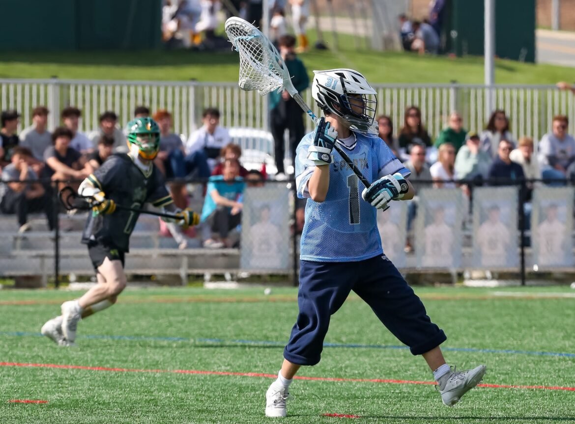 Jake Alliegro (1) of Sparta looks to pass against Morris Knolls during the boys lacrosse game at Morris Knolls High School in Rockaway NJ on Tuesday, April 30, 2024