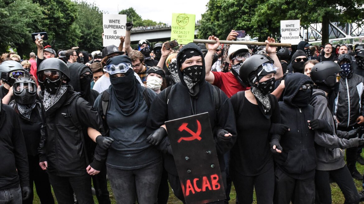 Members of Antifa line up during an alt-right rally on August 17, 2019 in Portland, Oregon.