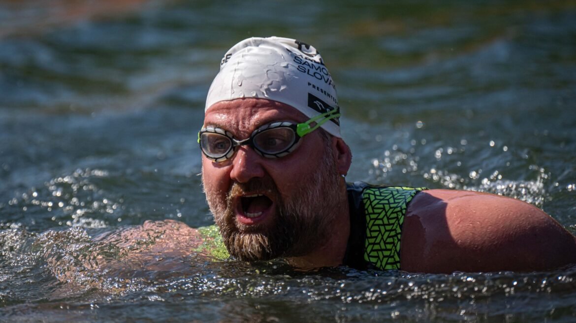 Avoid panicking in open water by using these strategies from Olympic coach Paul Asmuth.