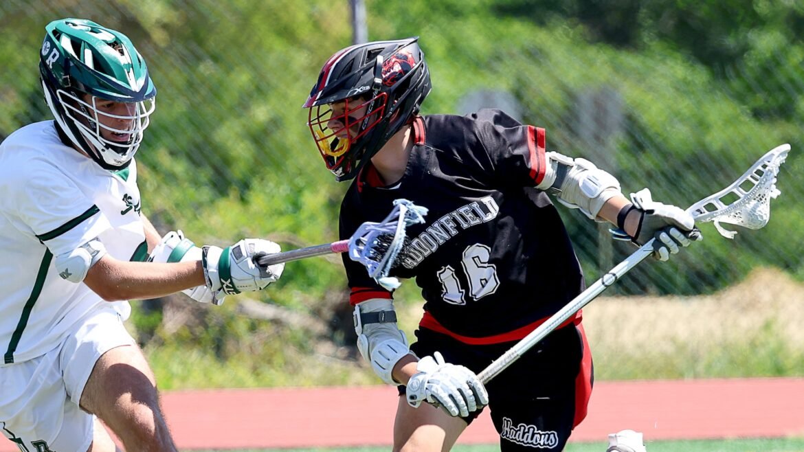 Owen Chiarieri (16) of Haddonfield tries to get through the defense of Brady Cunningham (4) of Ridge during the fourth quarter of the Ridge vs. Haddonfield boys lacrosse game at Haddonfield High School in Haddonfield, NJ, Saturday, May 16, 2026.
