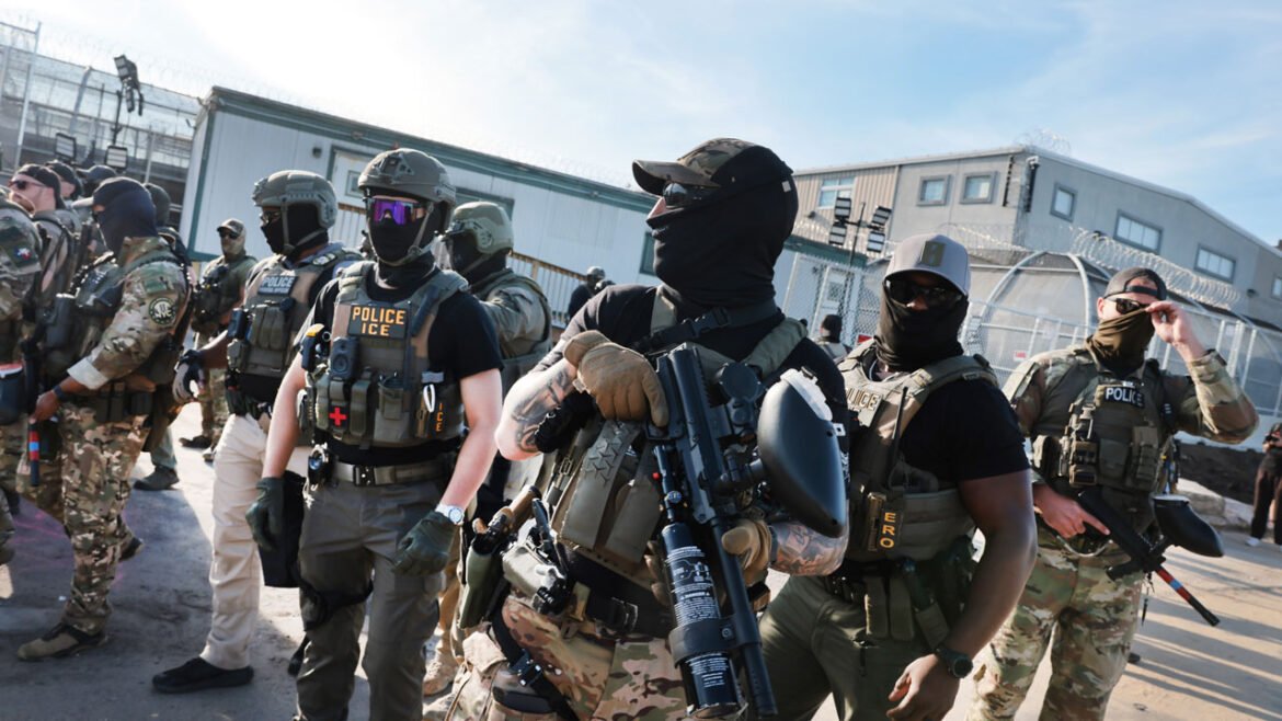 ICE agents confront protesters as they gather outside the federal immigration center.