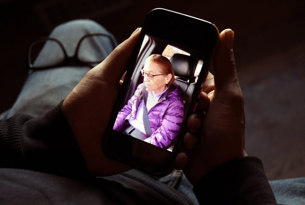 Gerald Begay, whose mother Ella Mae Begay went missing from her home, shows a photo of her on his phone in Denver, Thursday, April 2, 2026. (AP Photo/Thomas Peipert,File)