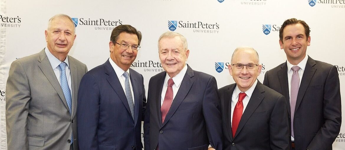 From left, Joseph Panepinto, '66, president and CEO of Jersey City-based Panepinto Properties and a member of the Saint Peter's Board of Trustees; Frank Fekete, '75, managing partner of Mandel, Fekete & Bloom CPAs; Frank Guarini, H '94; Eugene Cornacchia, P president of Saint Peter's University; and Jersey City Mayor Steven Fulop, H '14, together in September 2019 to announce the Frank J. Guarini School of Business at Saint Peter's University.