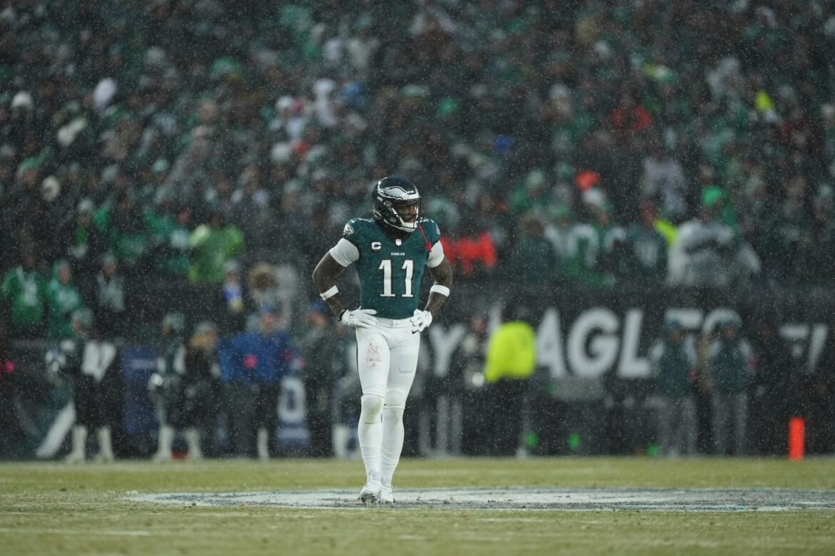 Eagles wide receiver A.J. Brown (11) stands in the snow during the first half of an NFL football NFC divisional playoff game against the Los Angeles Rams on Sunday, Jan. 19, 2025, in Philadelphia.