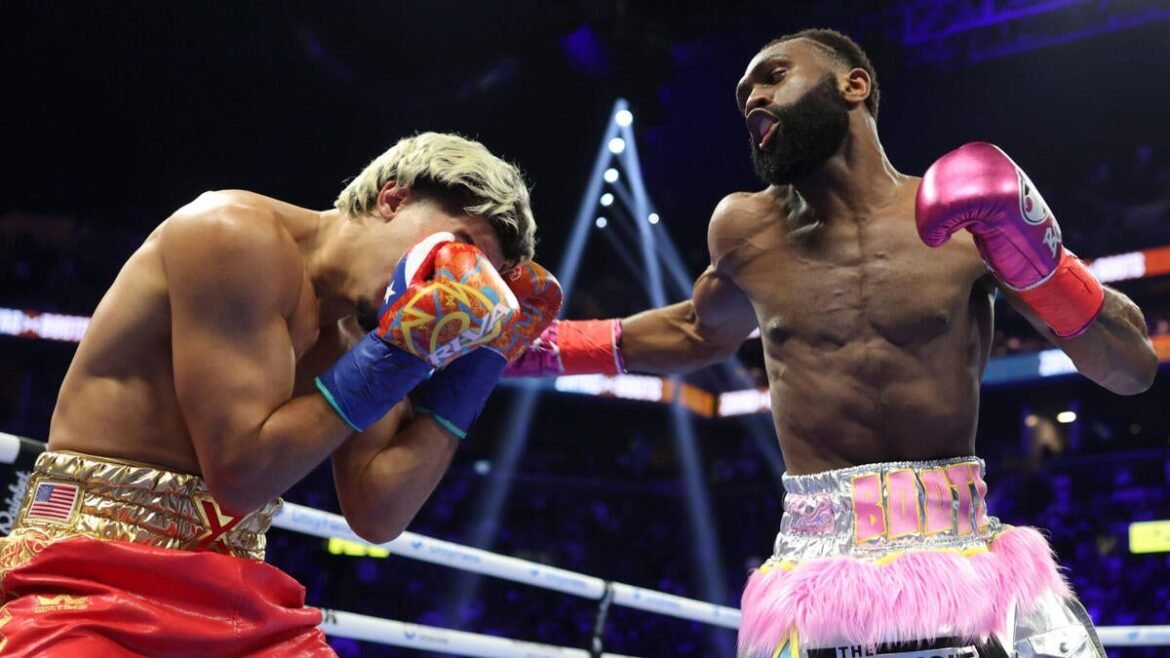 Jaron Ennis vs. Xander Zayas fight results: 'Boots' scores TKO win to claim 154-pound titles