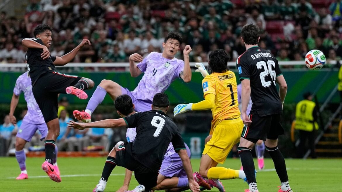 Mexico becomes first country to reach knockout stage of World Cup : NPR