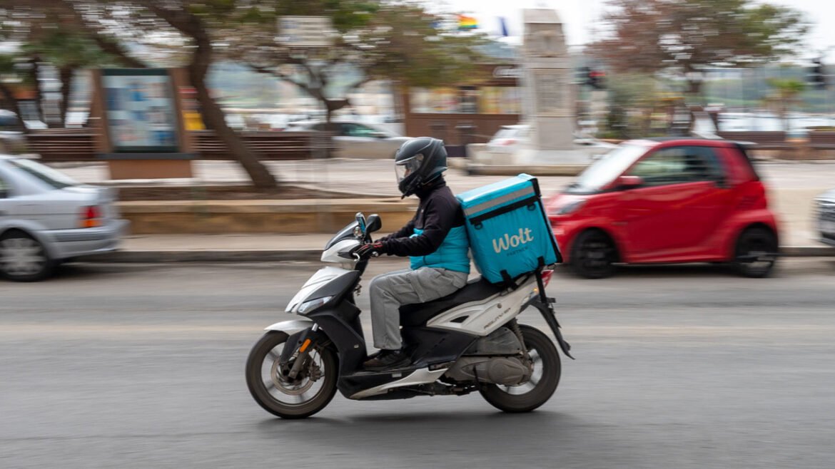 SLIEMA, MALTA - MARCH 8: A Wolt food-delivery rider makes a delivery on a scooter on March 8, 2026 in Sliema, Malta. (Photo by John Keeble/Getty Images)