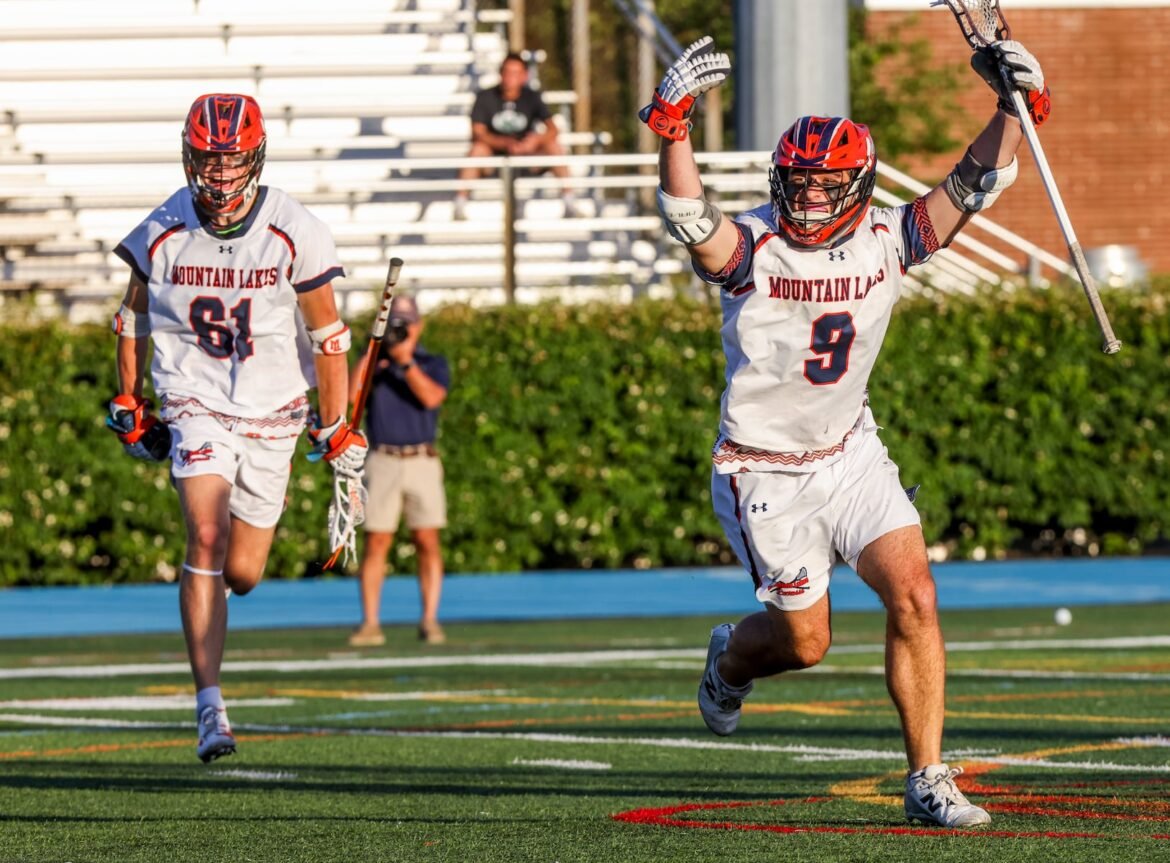 Holden Gillespie (9) of Mountain Lakes celebrates with Lawson Fagan (61) after scoring a goal against Delbarton during the boys lacrosse Kirst Cup Semifinal at Kean University in Union, NJ on Tuesday, June 16, 2026.