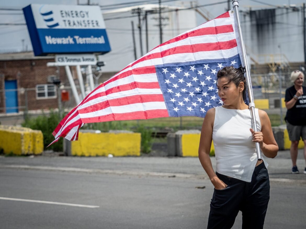 Alex James, the woman who was allegedly struck by a car driven by a GEO Group employee outside Delaney Hall last weekend, returned to the detention center on Sunday to continue protesting the treatment of detainees held at the facility.