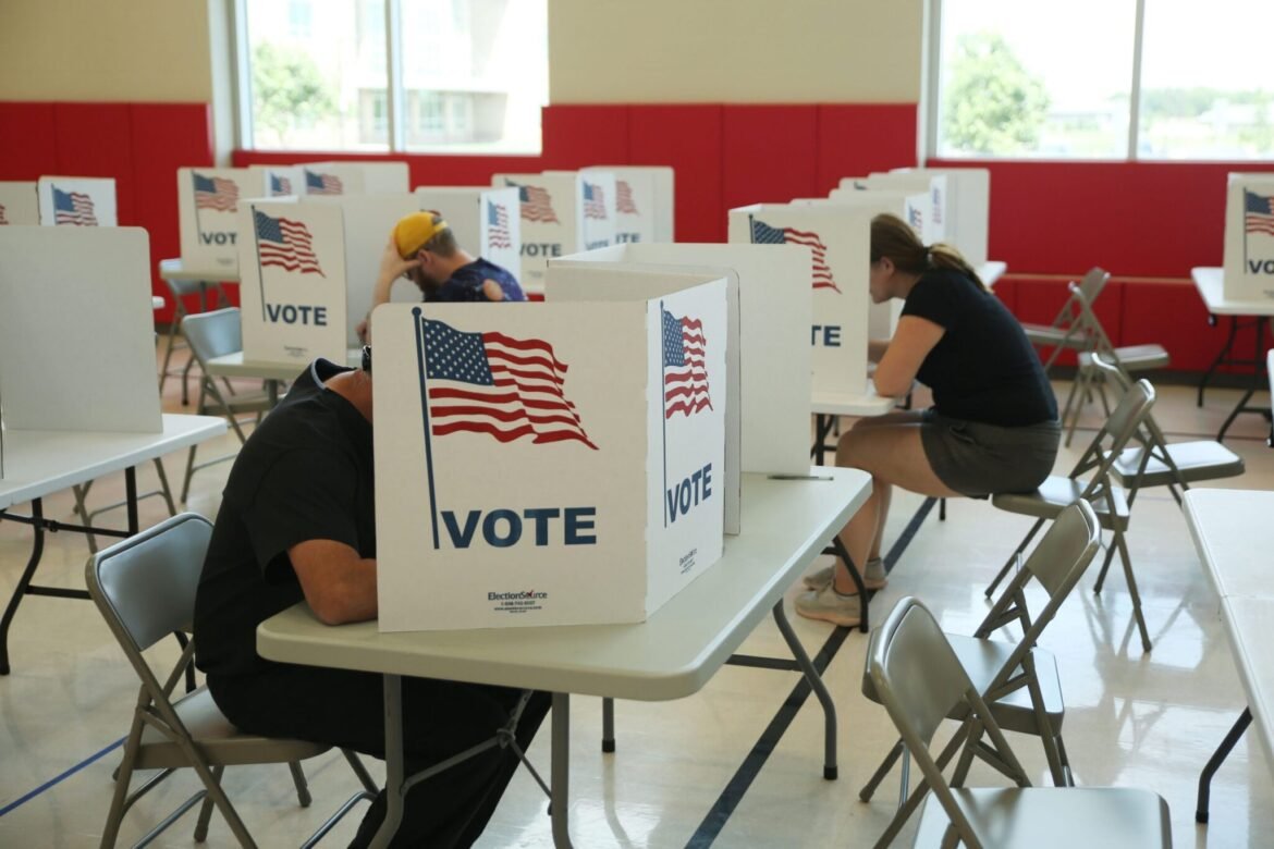 Voters fill out their ballots at a Sioux Falls polling place during the South Dakota primary election on June 2, 2026. (Photo by Makenzie Huber/South Dakota Searchlight)