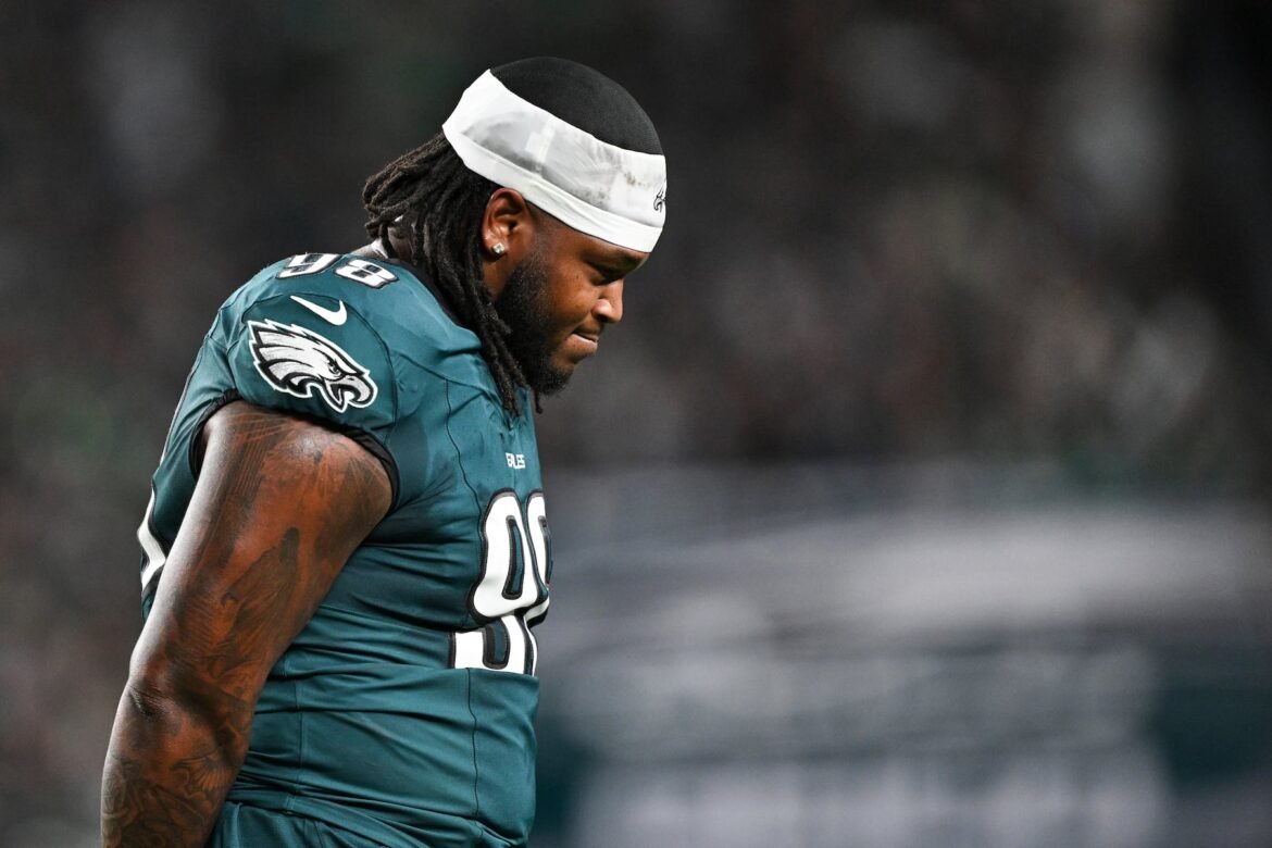 Philadelphia Eagles defensive tackle Jalen Carter walks off the field after being ejected from the game during the first quarter of Thursday's win against the Dallas Cowboys.