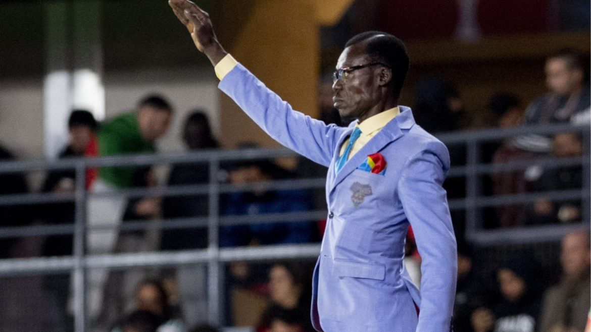 Who is DR Congo's famous fan and why does he stand for every game?