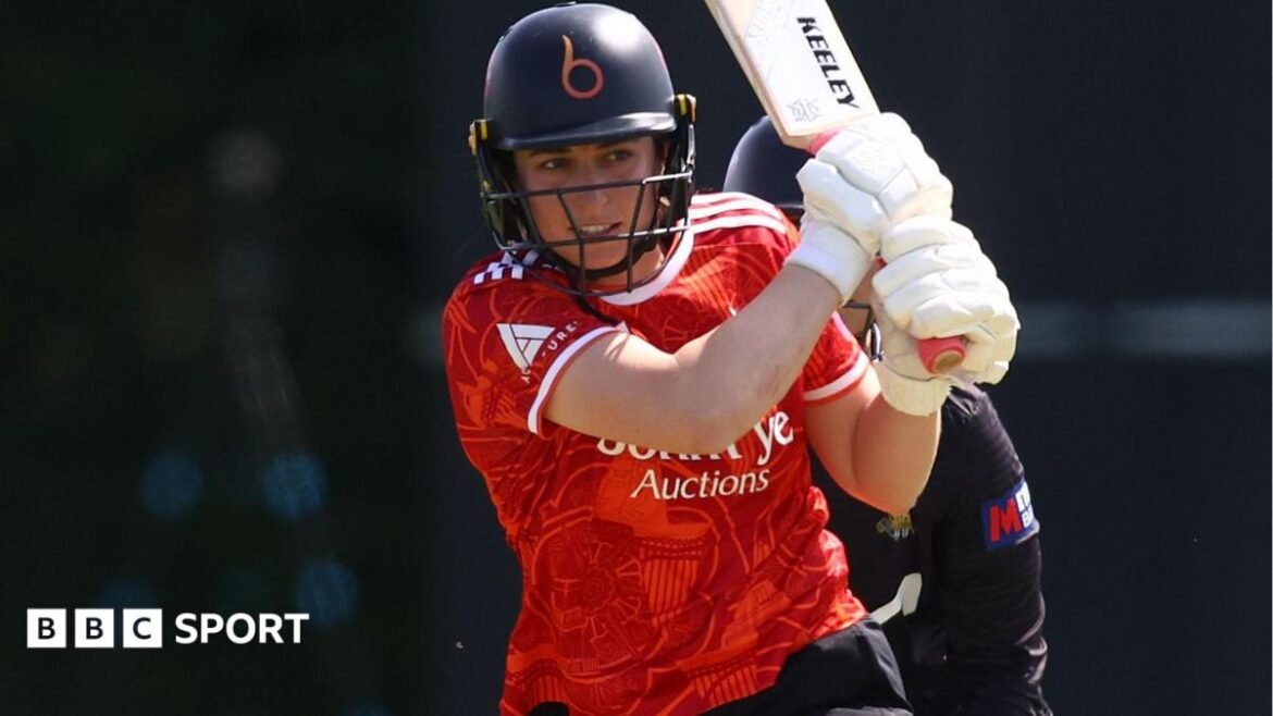 Marie Kelly watches after hitting a shot through the legside for The Blaze 