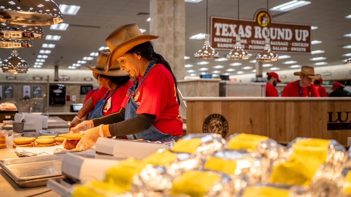 Employees prepare food inside of the Buc-ee's convenience store