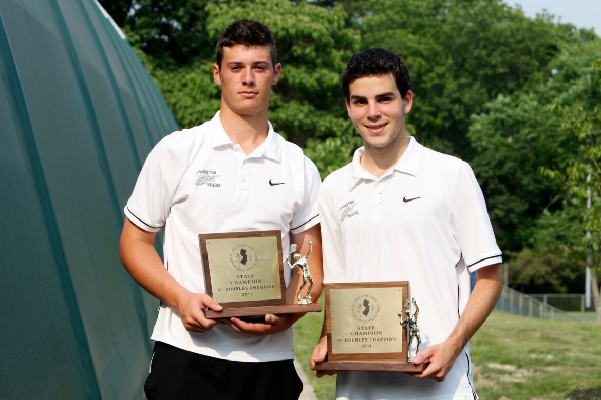 Livingston's Jesse Bloom, left, and Matt Wolff, show off their trophies after winning their doubles match against Jared Wishnow and Mac Johnson, of Millburn, during their lNJSIAA Boys Tennis Doubles Final at Mercer County Park Thursday June 9, 2011. Wolff and Bloom won 0-6, 6-2, 6-1.  Saed Hindash/The Star-Ledger SL