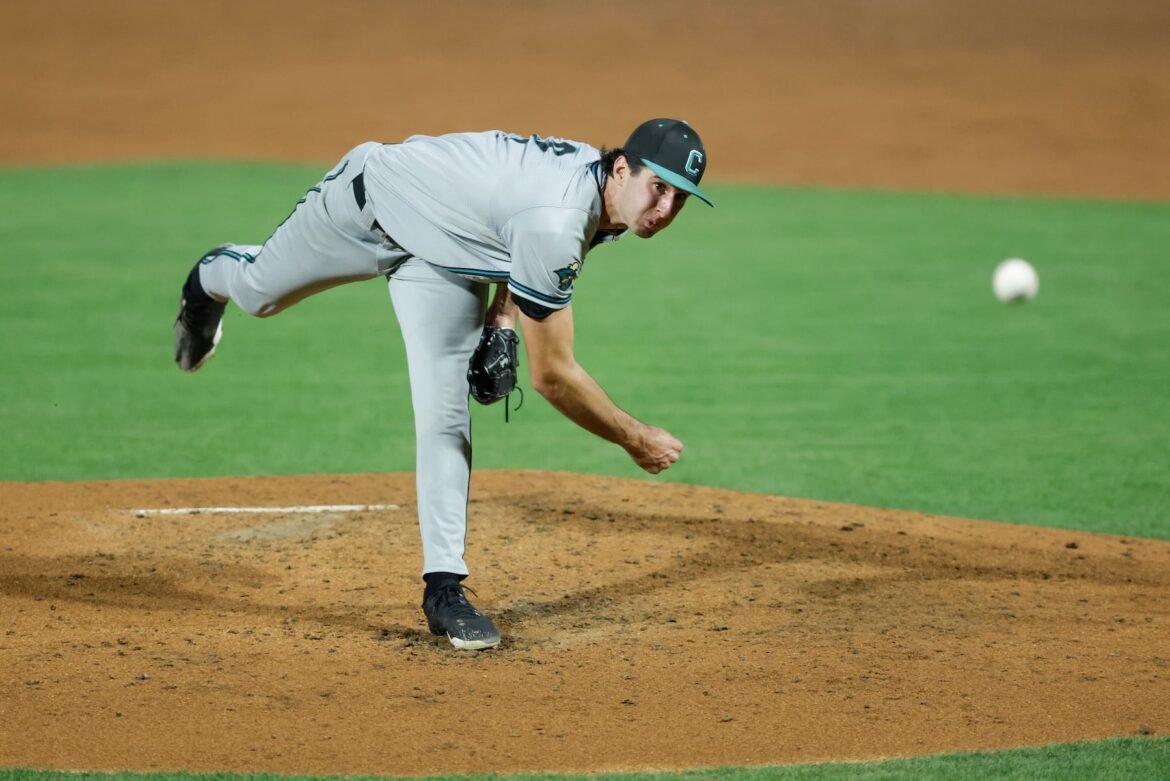 Coastal Carolina's Cameron Flukey (2) pitches during an NCAA super regional baseball game against Auburn on Friday, June 6, 2025 in Auburn, Ala. (AP Photo/Stew Milne)