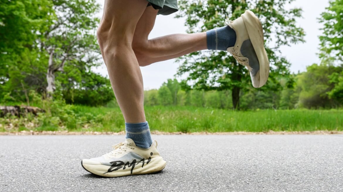Road runner jogging in BMAI Jingtan 3.0 Turbo Chinese running shoes on the road