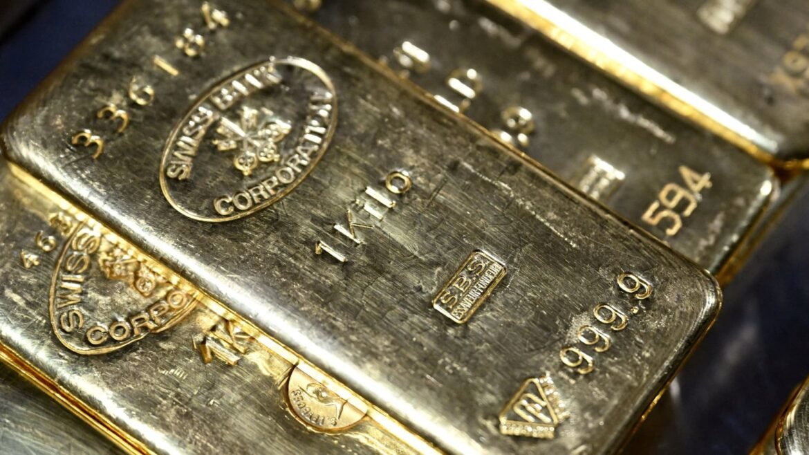 Gold and silver rise; gold on track for first weekly gain since May