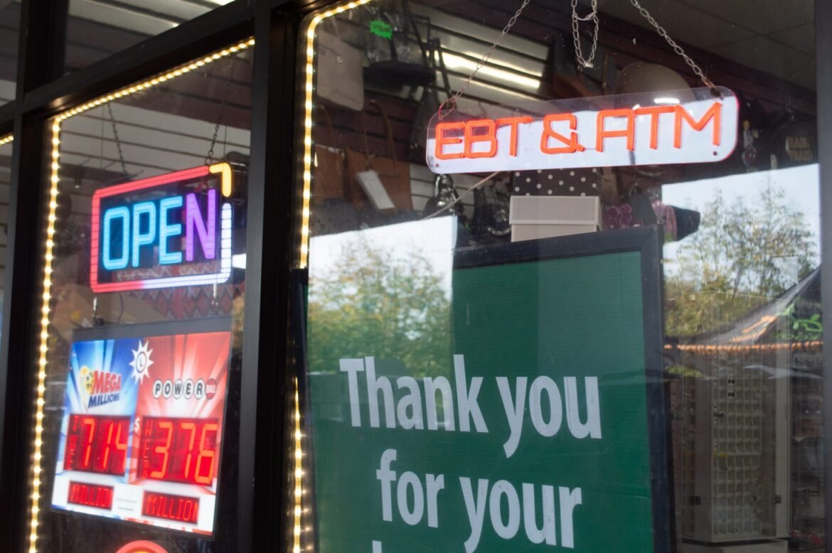A sign in a convenience store along Barlowe Road in Hyattsville, Maryland, on Tuesday, Oct. 28, 2025, advertises that it accepts SNAP benefits. (Photo by Ashley Murray/States Newsroom)