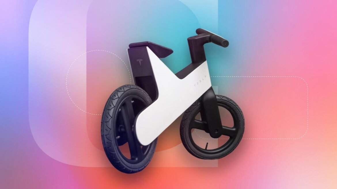 Tesla balance bike on a colorful background