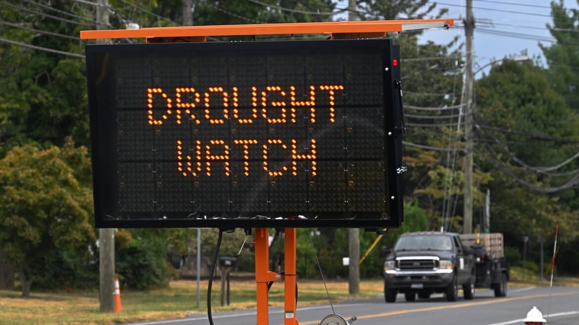 A road sign reminds drivers that the area is under drought watch.