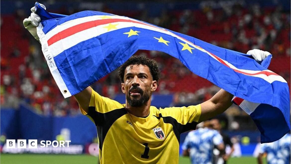 Vozinha holding Cape Verde flag