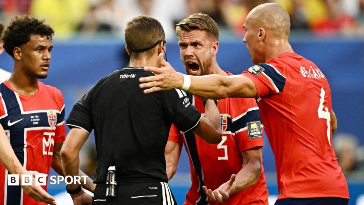 Norway's Kristoffer Ajer remonstrates with referee Clement Turpin 