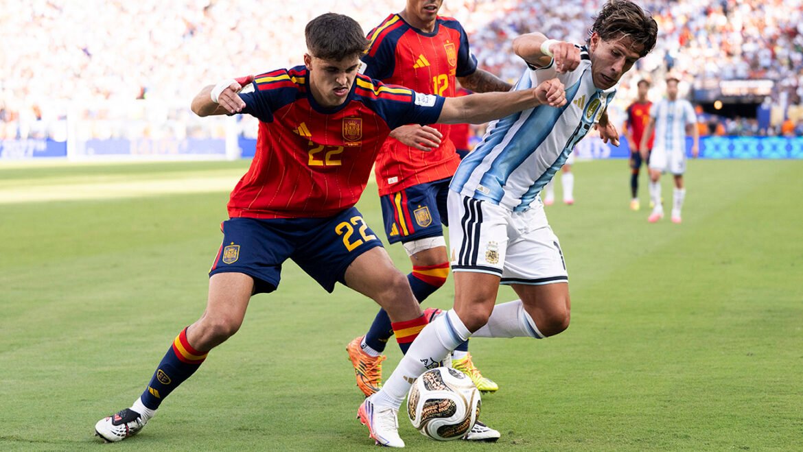 Pau Cubarsi #22 of Spain competes for the ball against Giuliano Simeone #17 of Argentina during the FIFA World Cup 2026 Final match between Spain and Argentina at New York New Jersey Stadium on July 19, 2026 in East Rutherford, New Jersey.