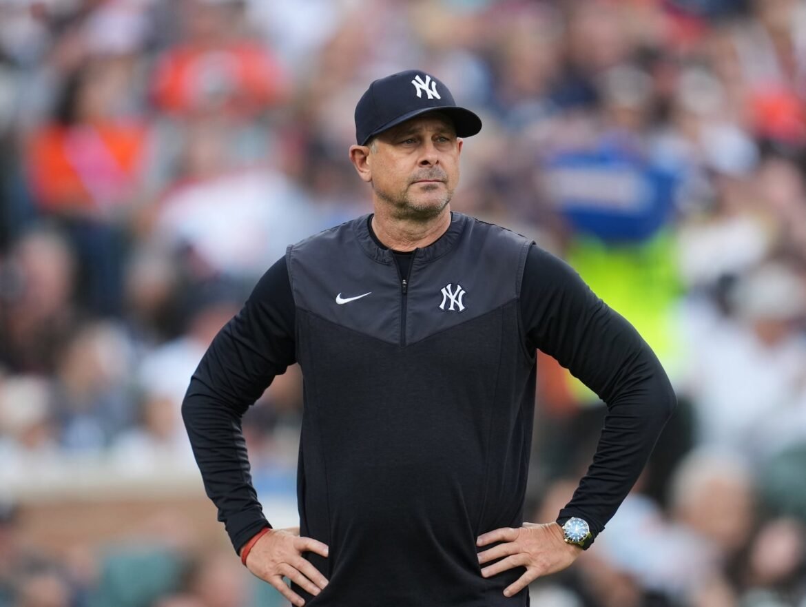 New York Yankees manager Aaron Boone watches against the Detroit Tigers during the fifth inning of a baseball game Monday, June 22, 2026, in Detroit. (AP Photo/Paul Sancya)